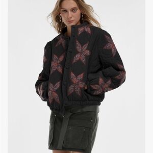 Women's Black Quilted Jacket with Red Star Pattern